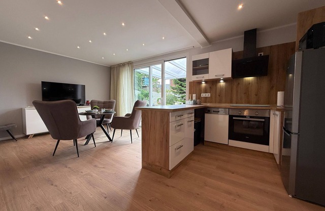 City Apartment Varel: Modern apartment with covered terrace in the city center