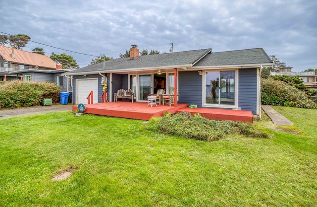 Classic Oregon Beach Home has private Deck, Fenced Yard, Fire Pit, and Hot Tub