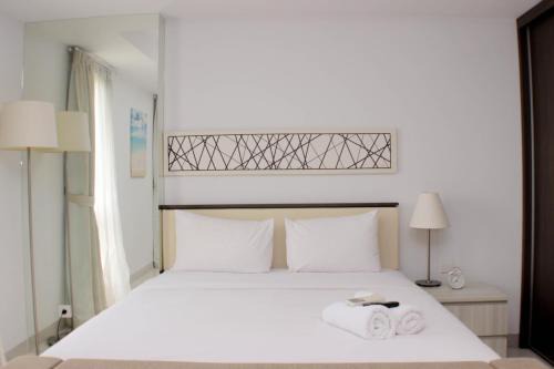 Comfort and Minimalist Studio at Azalea Suites Apartment By Travelio