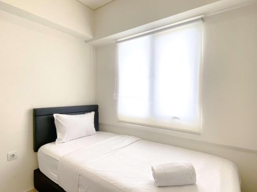 Comfortable and Spacious 3BR Meikarta Apartment By Travelio