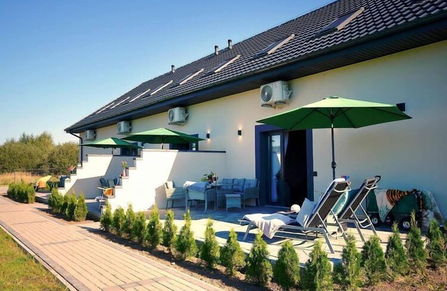Comfortable holiday homes with terraces, Mielenko