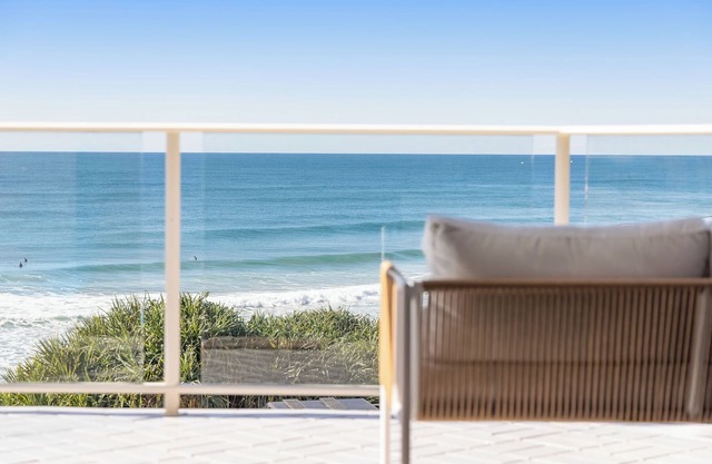 Contemporary beachfront apartment with breathtaking panoramic ocean views.