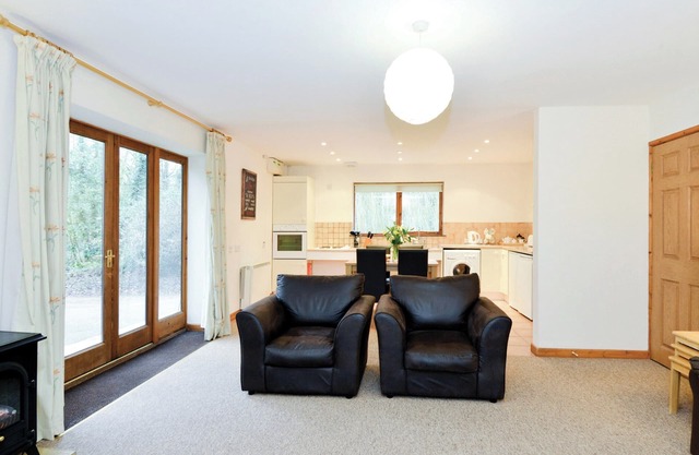 Contemporary cottage style single storey lodge.