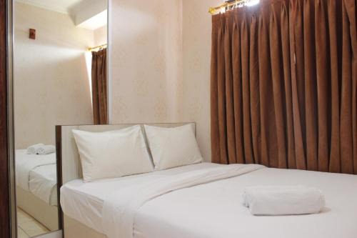 Cozy 2BR Tamansari Panoramic Apartment By Travelio