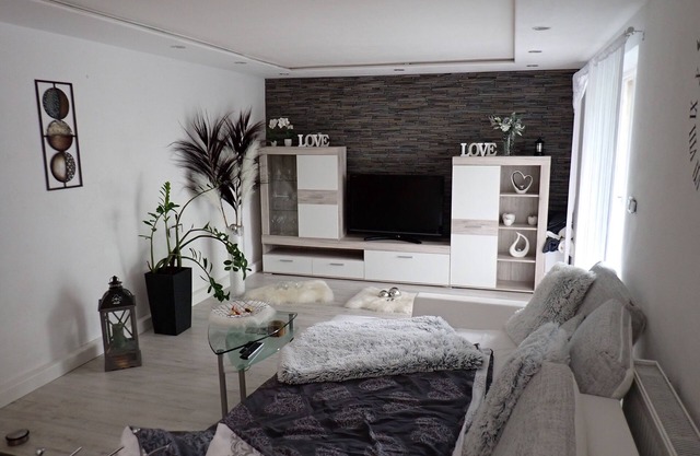 Cozy accommodation with spacious covered terrace right on the edge of the forest