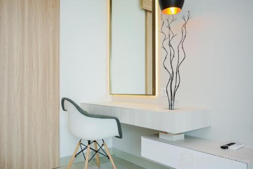 Cozy and Homey Studio at Bintaro Embarcadero Apartment By Travelio