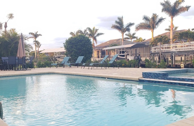 Cozy, bright, and spaciuos WF home with pool, dock, pool table & more.