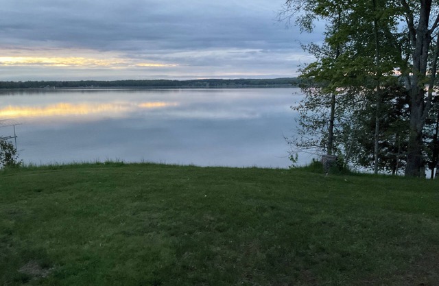 Cozy couples camper with your own private 100ft lake front.