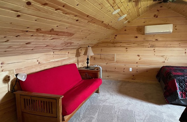 Cozy hillside retreat near trout stream, public forest and UTV trails.