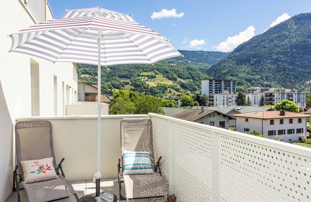 Cozy, Spacious condo with balcony and beautiful serene mountain views.