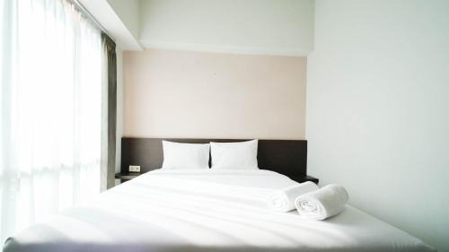 Cozy Stay 2BR at The Square Surabaya Apartment By Travelio