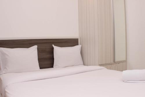 Cozy Stay Studio Urbantown Karawang Apartment By Travelio