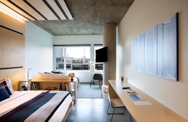 Delightful Room w/Unique Artisanal Eats, Cozy Furnishings & Rooftop Bar