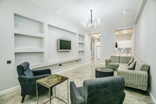Deluxe Apartment SaHiL Residence