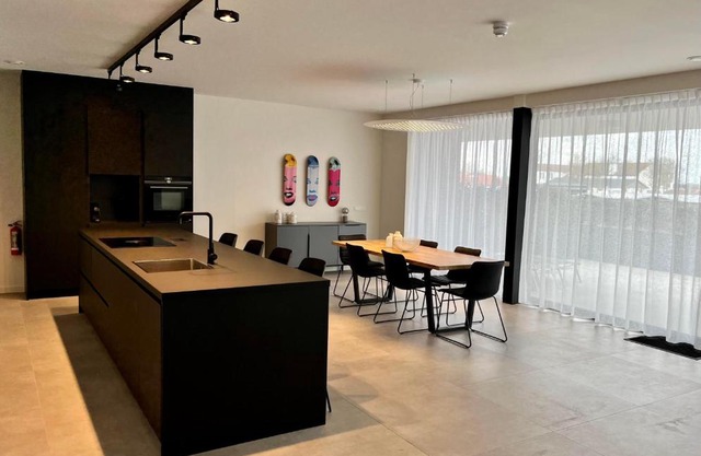 Design Apartment with 60m² terrace - heated inside pool and wellness facilities - very close to the beach