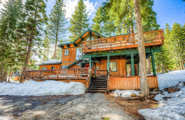 Dog-friendly cabin with private hot tub, fireplace, near skiing & the beach