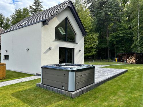Domek z Sauną i Jacuzzi Leśne SPA