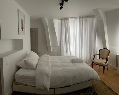 Duplex dernier étage avec terasse à deux pas de la grand place