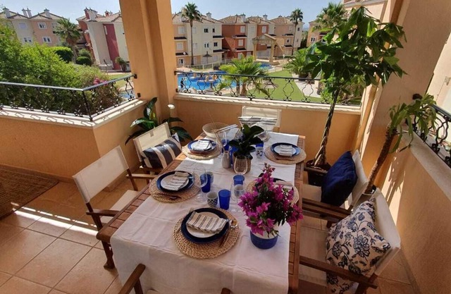 Duplex overlooking pools and mountains in Altaona Golf