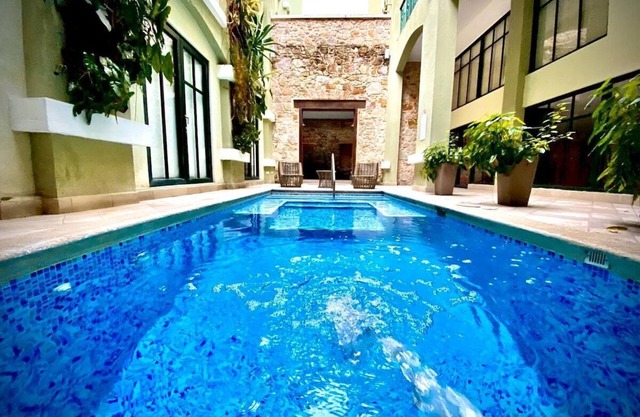 Duplex with pool in front of national theater D6