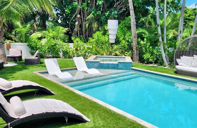 EAST of A1A WITH Private Beach Guest house, Heated Pool, AND 6 seater Golf Cart!