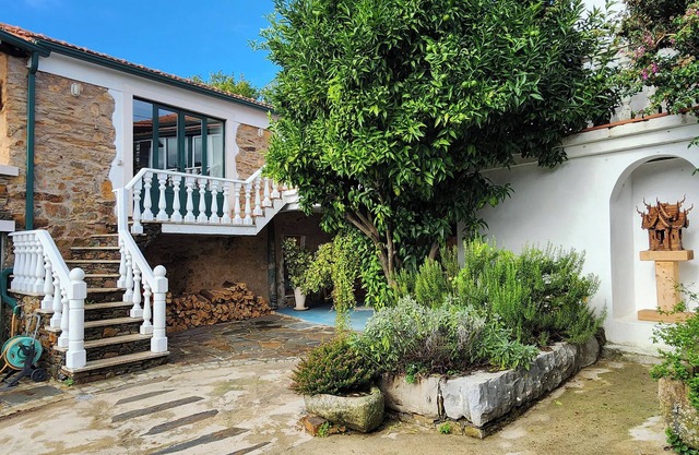 Enchanting converted wine cellar with panoramic views of the surrounding hills.