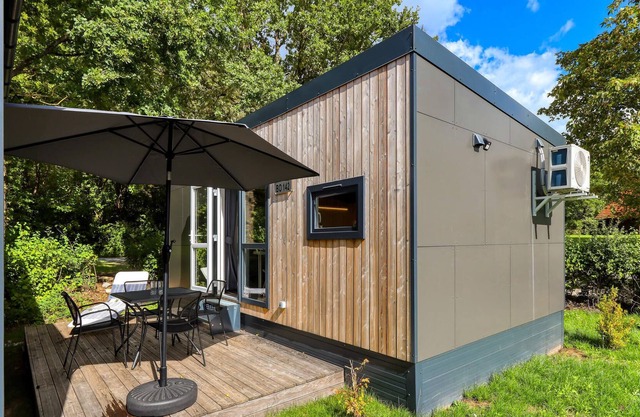 Enjoy a real Tiny Haus vacation close to nature at Camping Park Wemding!