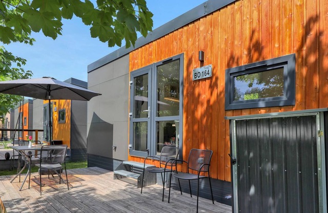 Enjoy a real Tiny Haus vacation close to nature at Camping Park Wemding!