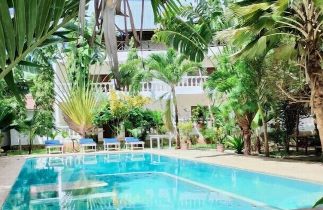Enjoy sunsets poolside at a fully equipped studio apartment oasis