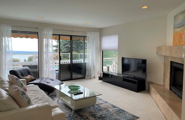 — Enjoy the oceanview poolside home in British Property