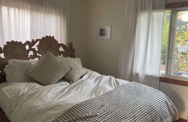 Escape to our enchanting Beach Cottage Oasis with its own private pool and spa.