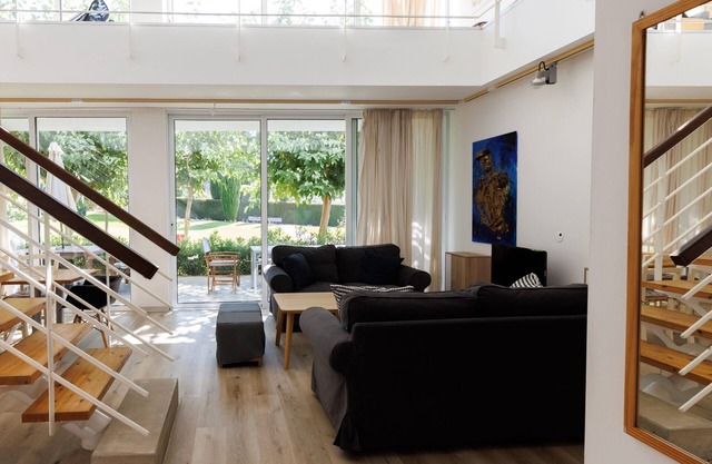 Eupraxia | Three-Bedroom Apartment, Art by PraXis Apartments