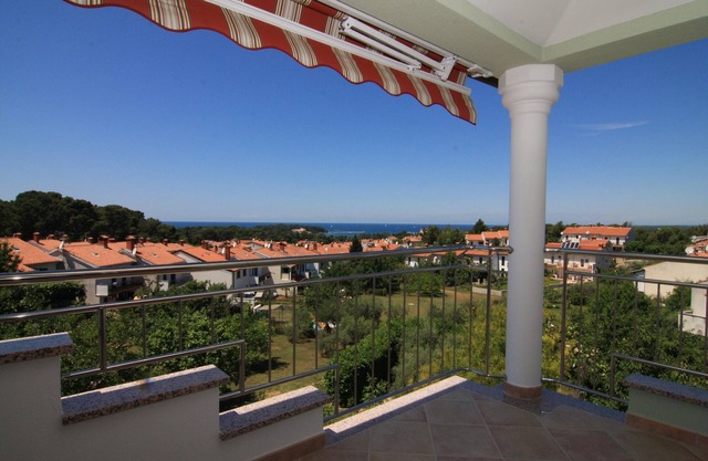 Exclusive apartment Beethoven with a view of the Adriatic Sea and Porec in a prime location of Porec
