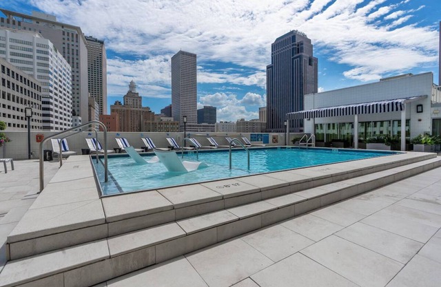 Experience City Views & Rooftop Pool – Steps from French Quarter & Bourbon St