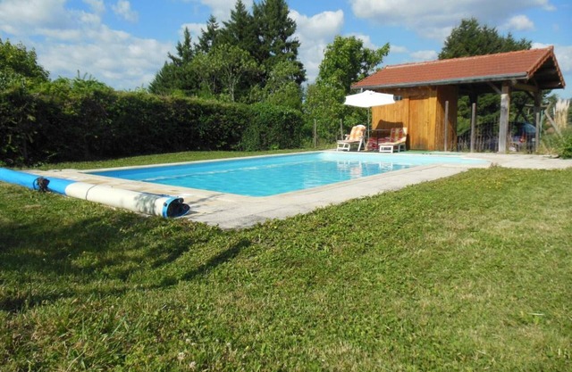 Family cottage with shared pool and fireplace in Renaison