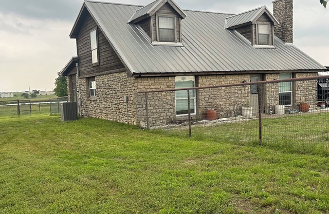 Family farmhouse between Stephenville and Hico.