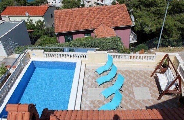 Family friendly house with a swimming pool Postira, Brač (K-5661)