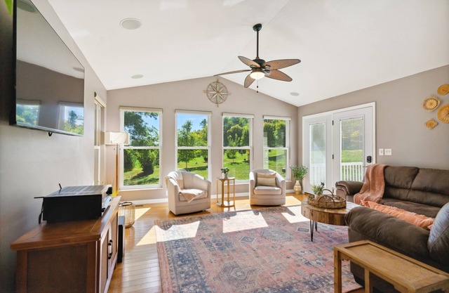 Family-friendly house with large deck & yard adjoining local Christmas tree farm