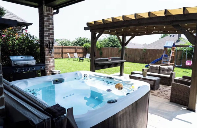 Family Fun 3BR Getaway with Hot Tub and Play Yard