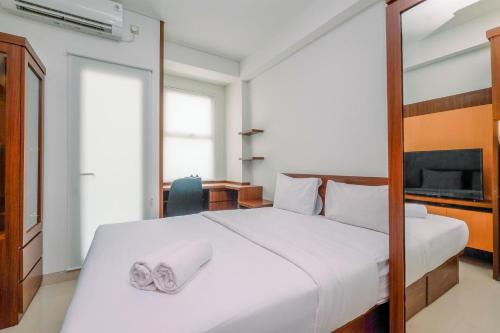 Fancy and Nice Studio Apartment at Transpark Cibubur By Travelio
