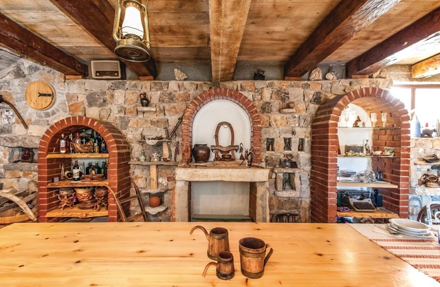 Fantastic holiday home with pool in the hinterland of Split, situated on a large plot.