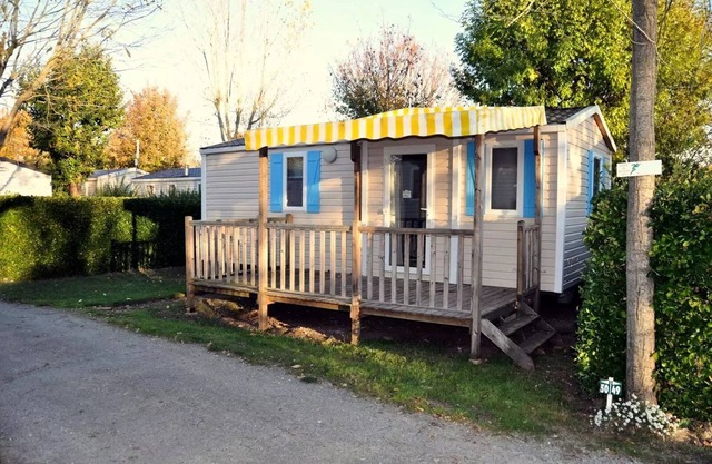 Flower Camping L'Abri-Côtier * - Mobilehome Sunny 27m2 CONFORT+ - 2 bedrooms + covered terrace + TV 5 persons