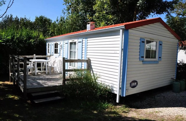 Flower Camping L'Abri-Côtier * - Mobilhome Eco5 26m2 STANDARD - 2 bedrooms + terrace (without TV) 5 persons