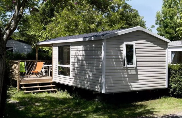 Flower Camping L'Abri-Côtier * - Mobilhome Loggia Privilege 26m2 PREMIUM - 2 bedrooms + covered terrace + TV + dishwasher 5 people