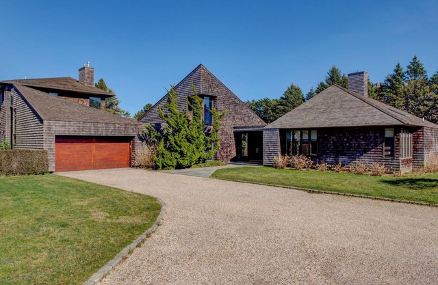 Glam-style home with private pool, open-floor plan, floor-to-ceiling.