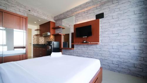 Good Deals and Comfy Studio at Bale Hinggil Apartment By Travelio