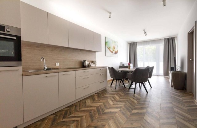 Grey Harmony Apartment by UniqueRent