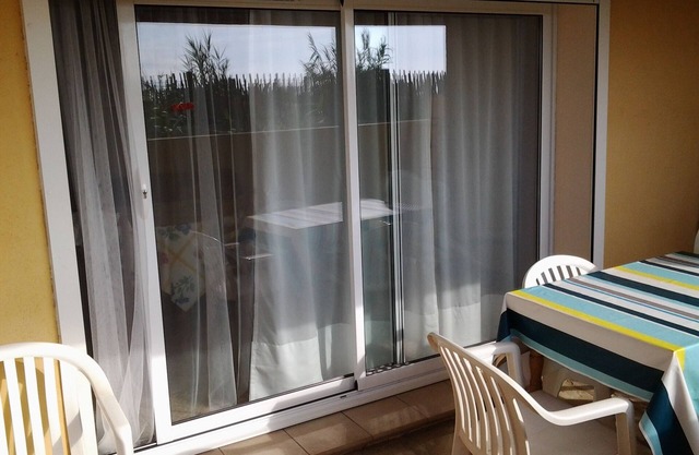 Ground floor apartment in villa, seafront, beachfront.