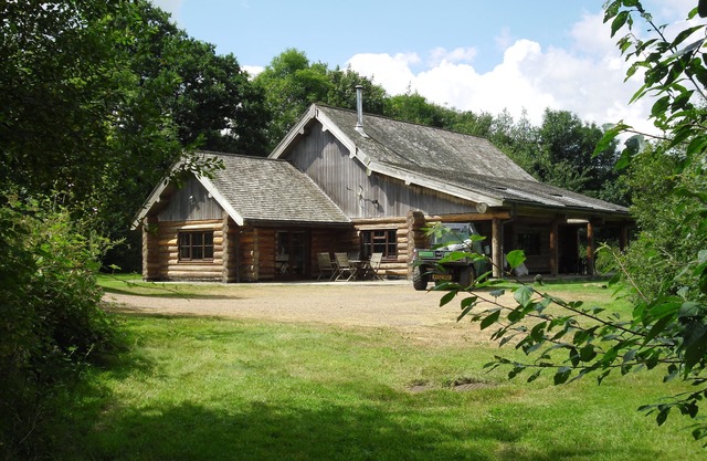 Hand Crafted large Log Cabin . Rural Location , lovely views and walks , quiet .