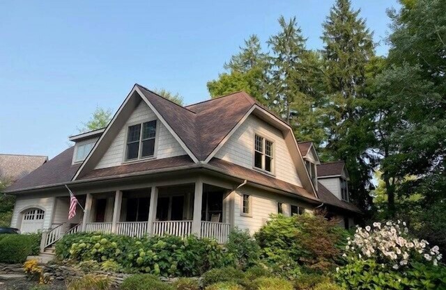 Hanson House: Exceptional, one-of-a-kind property with soaring vaulted ceilings and lovely porches!